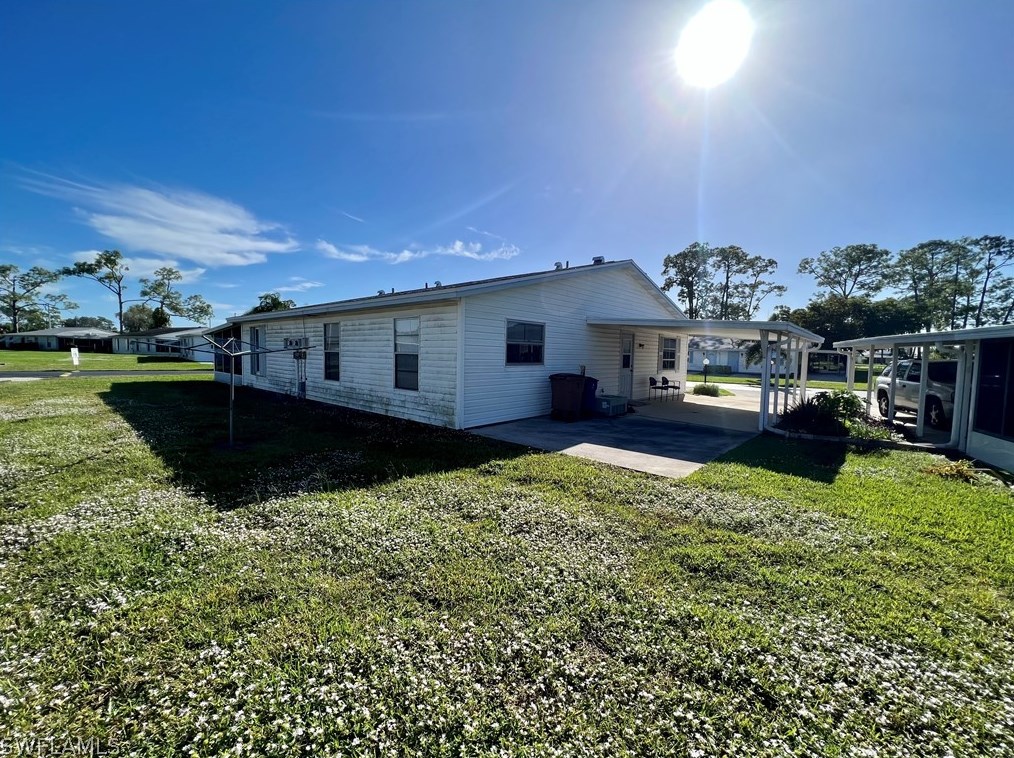 18 Pinewood Blvd, Lehigh Acres FL  33936-7304 exterior