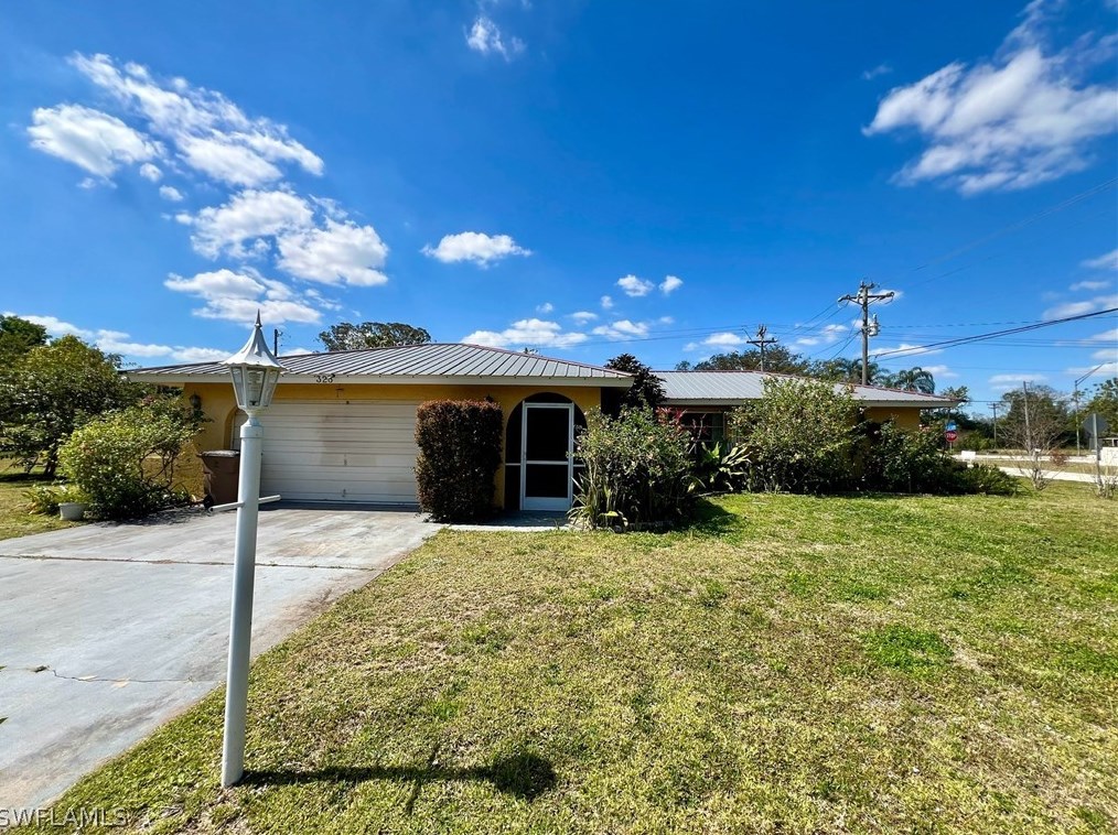323 Edward Ave, Lehigh Acres FL 33936-0904 exterior