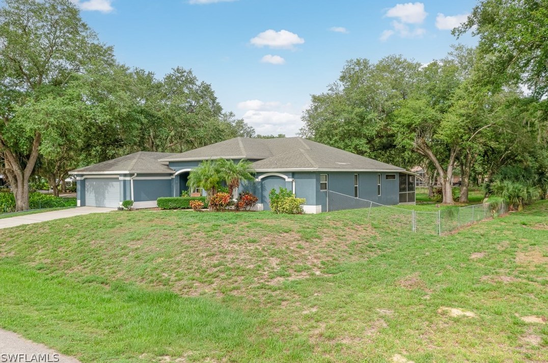 1813 Jackson Ave, Lehigh Acres FL 33972-2523 exterior