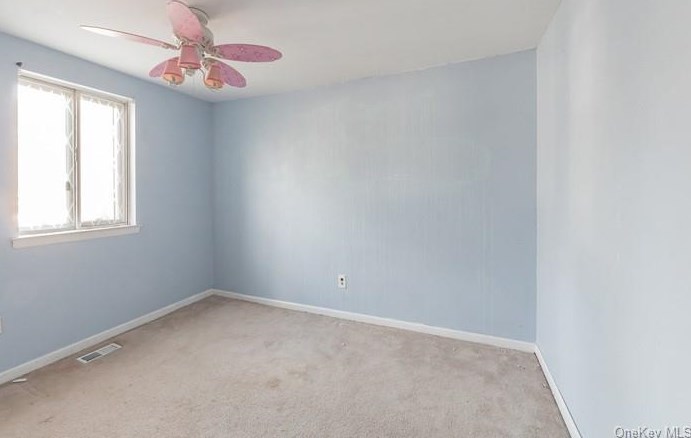 66 Birchwood Rd, Gordon Heights NY  11763-1231 exterior