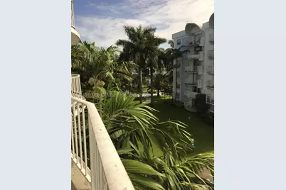 498 NW 165th St #D401, Miami, FL 33169 - Photo 1