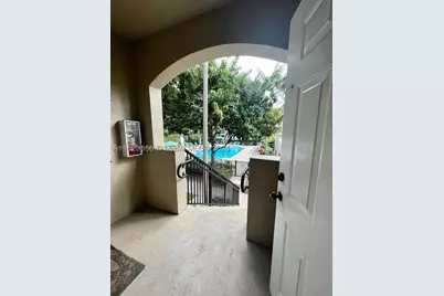 5940 W Sample #304, Coral Springs, FL 33067 - Photo 1