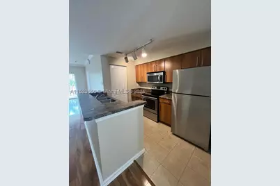 5940 W Sample #304, Coral Springs, FL 33067 - Photo 11