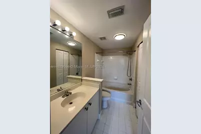 5940 W Sample #304, Coral Springs, FL 33067 - Photo 13
