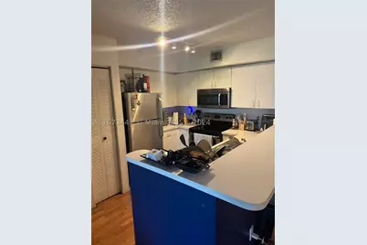 4580 NW 107th #104-13, Doral, FL 33178 - Photo 3