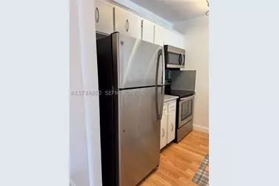1225 NE 124th #33A, North Miami, FL 33161 - Photo 1