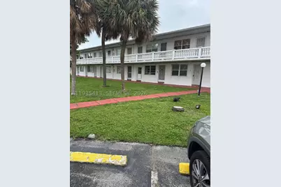 65 NE 202nd #Q27, Miami Gardens, FL 33179 - Photo 1