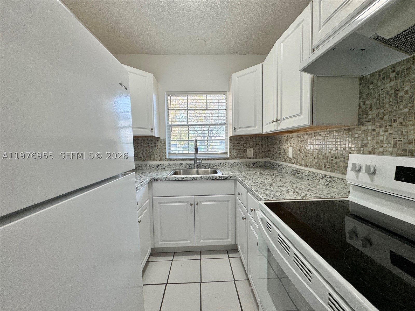 4140 Woodside #107 - 4140 Woodside #107, Coral Springs, FL 33065 Luxury Property | Jose Angel Pina