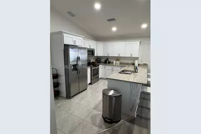 1119 Tropicana Pkwy W, Cape Coral, FL 33993 - Photo 9