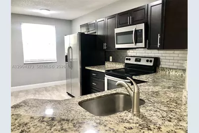 8761 Wiles #306, Coral Springs, FL 33067 - Photo 1