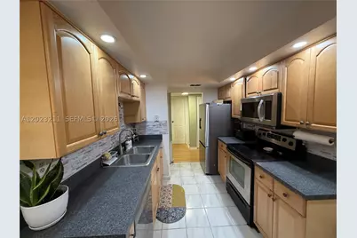 450 Commodore #306, Plantation, FL 33325 - Photo 13