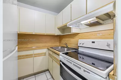 5050 NW 7th #211, Miami, FL 33126 - Photo 9