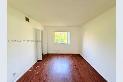 107 Gardens #106, Pompano Beach, FL 33069 - Photo 13
