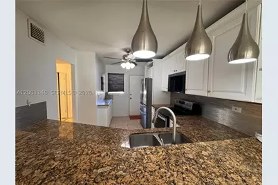 1670 NE 191st #100-3, Miami, FL 33179 - Photo 1