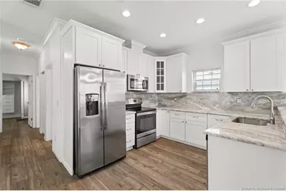 445 Nettles Boulevard, Jensen Beach, FL 34957 - Photo 11