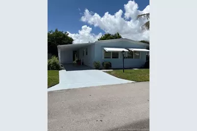 443 NE Pinelake Village Boulevard, Jensen Beach, FL 34957 - Photo 1