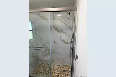 15925 Indianwood Circle SW, Indiantown, FL 34956 - Photo 17