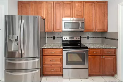 937 NW Waterlily Place, Jensen Beach, FL 34957 - Photo 11