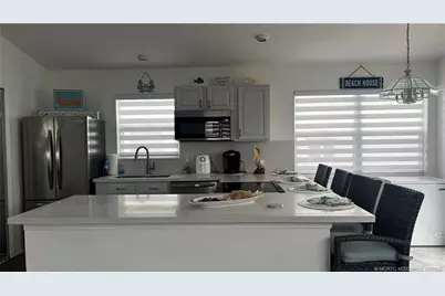 1077 Nettles Boulevard, Jensen Beach, FL 34957 - Photo 7