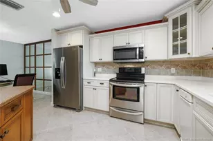 2310 SW Bobalink Ct, Palm City, FL 34990 - Photo 13