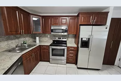 1750 NE 191st #325-4, Miami, FL 33179 - Photo 1