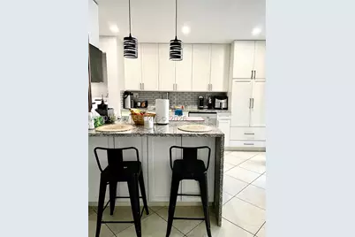 3450 Blue Lake #107, Pompano Beach, FL 33064 - Photo 1