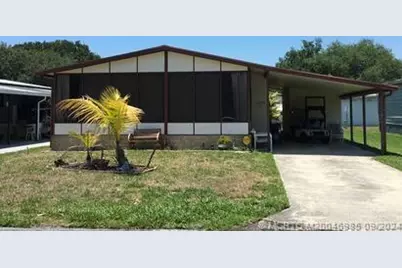 15925 Indianwood Circle SW, Indiantown, FL 34956 - Photo 1