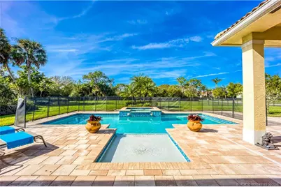 7392 SE Ravissant Drive, Stuart, FL 34997 - Photo 1