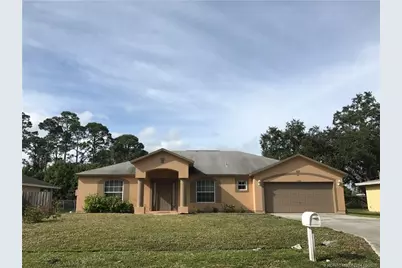 1180 SE Ladner Street, Port Saint Lucie, FL 34983 - Photo 1