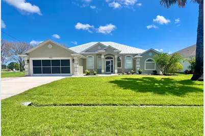 5952 NW Favian Avenue, Port Saint Lucie, FL 34986 - Photo 1