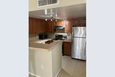 1727 Village Boulevard #111, West Palm Beach, FL 33409 - Photo 3
