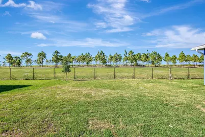 1549 Sawgrass Whisper Way, The Acreage, FL 33470 - Photo 49