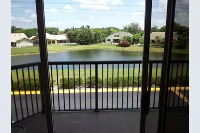 8761 Wiles Road #303, Coral Springs, FL 33067 - Photo 1