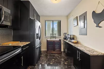 2741 Village Boulevard #303, West Palm Beach, FL 33409 - Photo 11