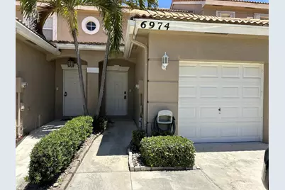6974 Oak Bridge Lane, Greenacres, FL 33467 - Photo 1