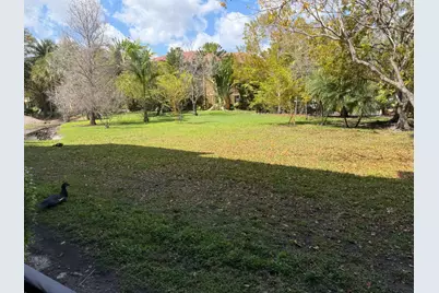 711 N Pine Island Road #104, Plantation, FL 33324 - Photo 9