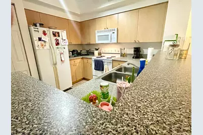 8010 N Nob Hill Road #106, Tamarac, FL 33321 - Photo 7