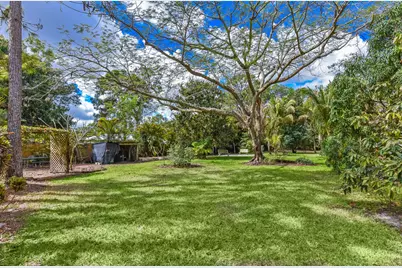 16244 E Downers Drive E, The Acreage, FL 33470 - Photo 51