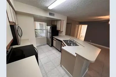 9999 Summerbreeze Drive #109, Sunrise, FL 33322 - Photo 11