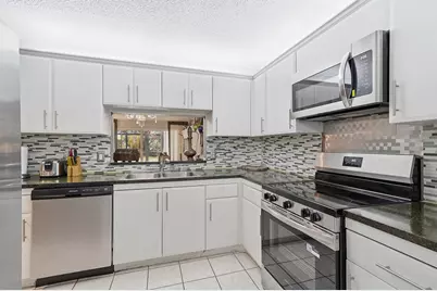 1774 Hammock Boulevard #118, Coconut Creek, FL 33063 - Photo 13