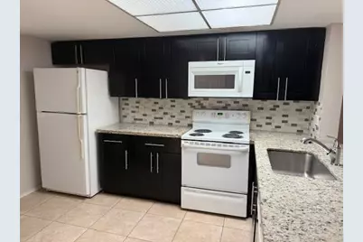 104 N Palm Beach Trace Drive #104, Royal Palm Beach, FL 33411 - Photo 1