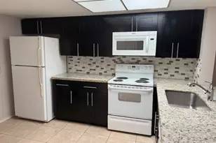 104 N Palm Beach Trace Dr, Royal Palm Beach, FL 33411 - Photo 1