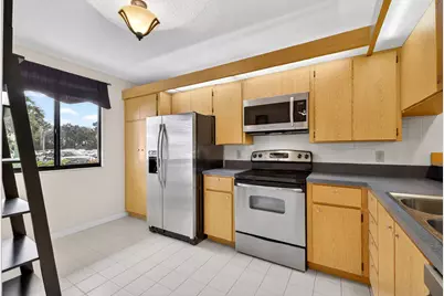 2811 Village Boulevard #106, West Palm Beach, FL 33409 - Photo 7