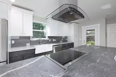 1036 NE Wright Avenue, Jensen Beach, FL 34957 - Photo 1