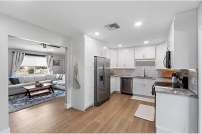 8913 SE Sandridge Avenue, Hobe Sound, FL 33455 - Photo 13