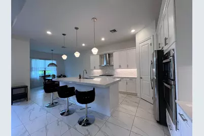 5663 Saint Armands Way, The Acreage, FL 33470 - Photo 3