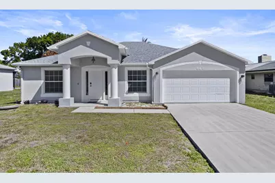 861 SE Cavern Avenue, Port Saint Lucie, FL 34983 - Photo 1