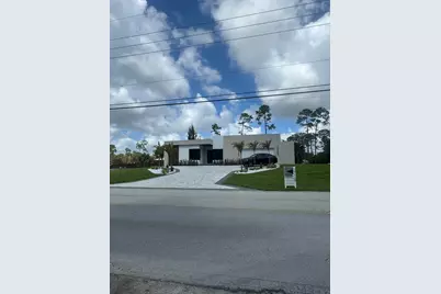 17107 W Sycamore Drive W, The Acreage, FL 33470 - Photo 1