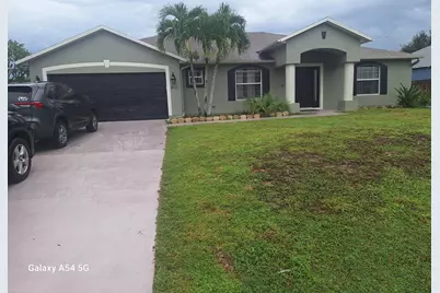 4641 SW Alpha Street, Port Saint Lucie, FL 34953 - Photo 1