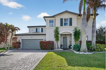 7477 NW Greenspring Street, Port Saint Lucie, FL 34987 - Photo 1